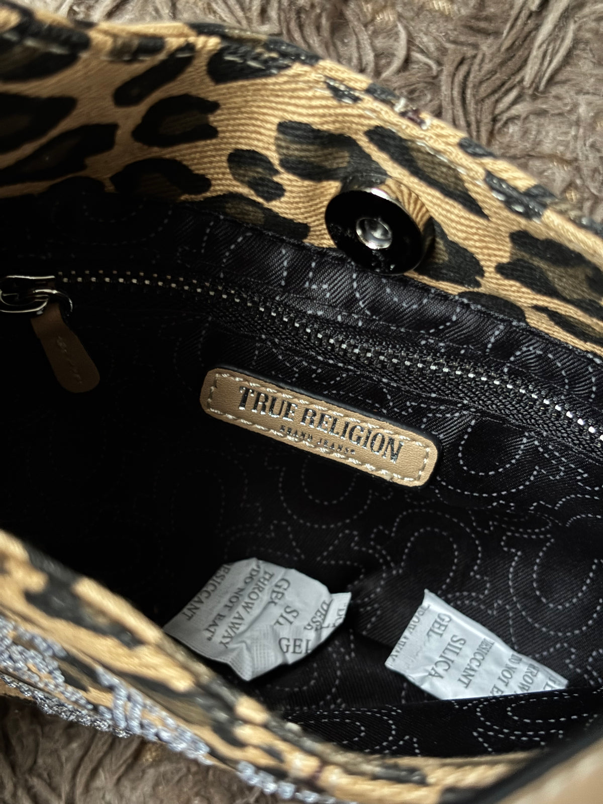 Bolso True Religion 🦒