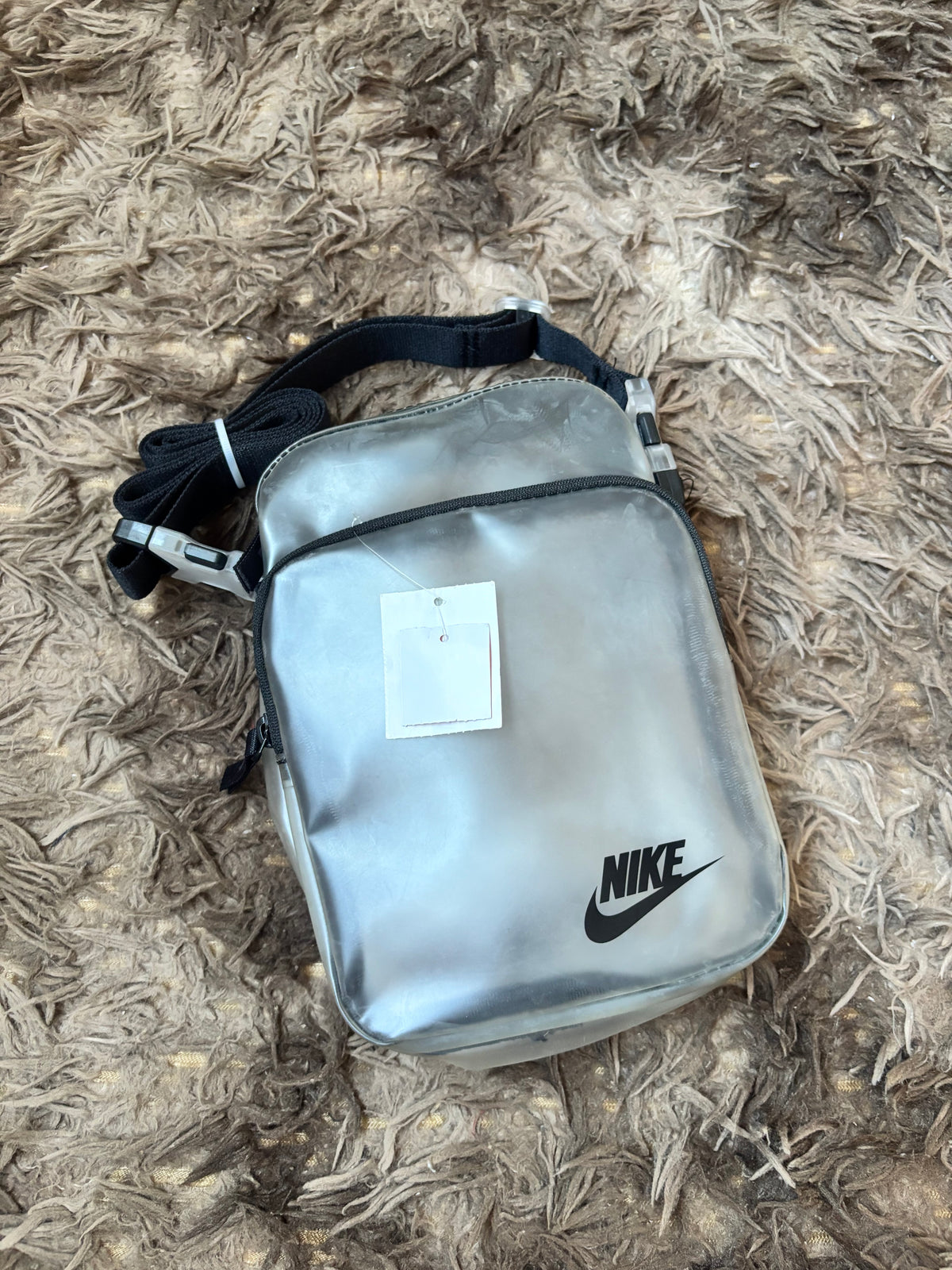 Carriel Nike trasparente