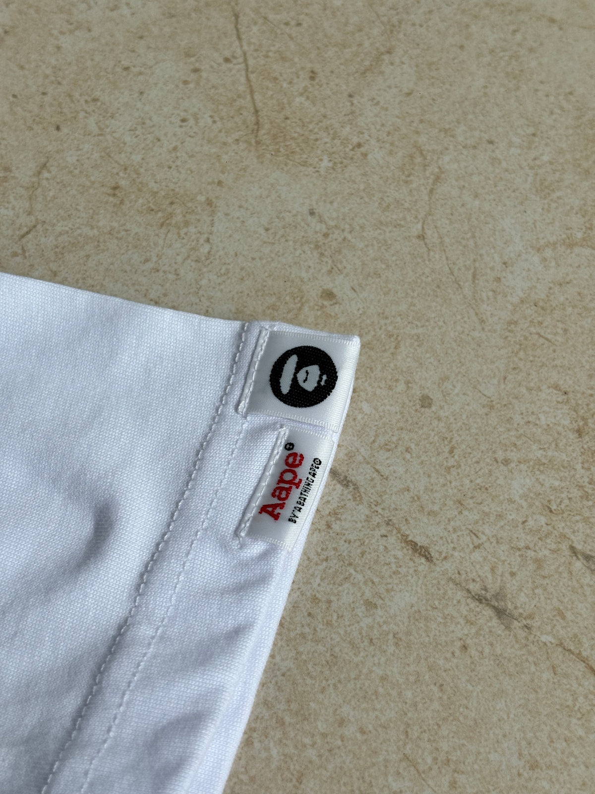 Aape by a Bathing Bape AAPEUNVS ‘Moonface Tee’ 2026